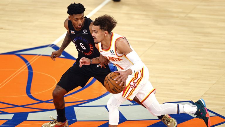 Atlanta Hawks&#39; Trae Young tries to get past New York Knicks&#39; Elfrid Payton during the first quarter of Game 2 in an NBA basketball first-round playoff series Wednesday, May 26, 2021, in New York. (Elsa/Pool Photo via AP) 