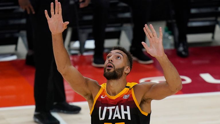 Utah Jazz center Rudy Gobert (27) looks at the scoreboard following a foul during the second half of Game 2 of the team&#39;s NBA basketball first-round playoff series against the Memphis Grizzlies on Wednesday, May 26, 2021, in Salt Lake City. (AP Photo/Rick Bowmer)


