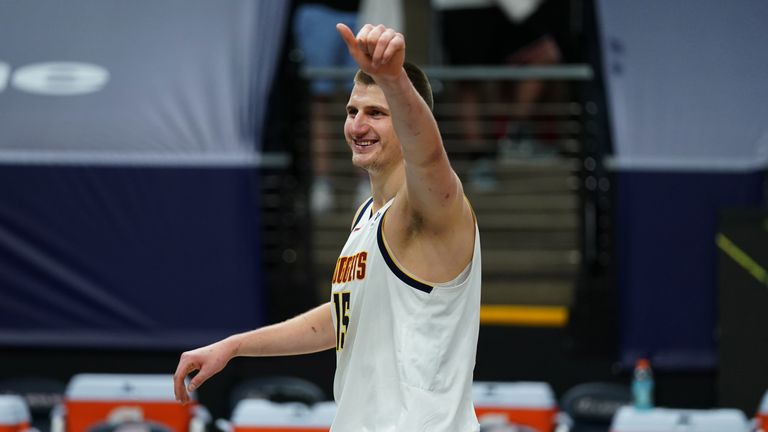 Nikola Jokic #15 of the Denver Nuggets smiles after the game against the Minnesota Timberwolves on May 13, 2021 at Target Center in Minneapolis, Minnesota. 