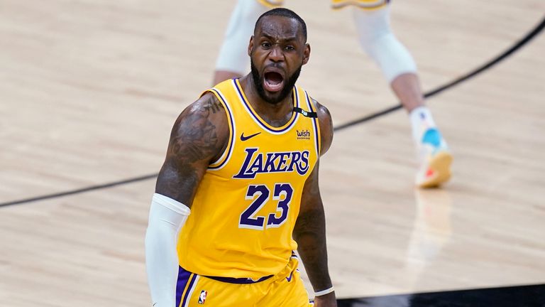 Los Angeles Lakers forward LeBron James celebrates his 3-pointer against the Phoenix Suns during the second half of Game 2 of an NBA basketball first-round playoff series Tuesday, May 25, 2021, in Phoenix. The Lakers won 109-102. (AP Photo/Ross D. Franklin)

