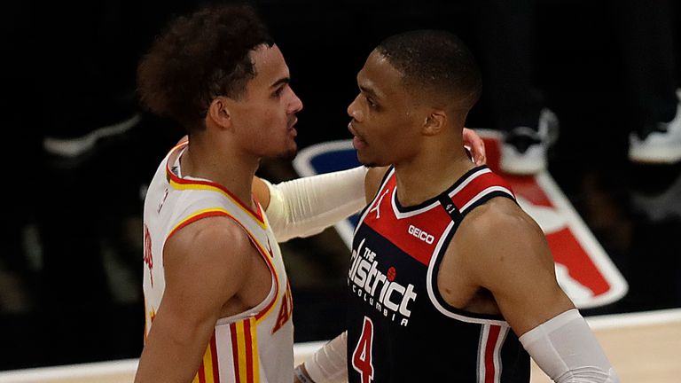 Washington Wizards&#39; Russell Westbrook, right, is congratulated by Atlanta Hawks&#39; Trae Young after an NBA basketball game Monday, May 10, 2021, in Atlanta. Westbrook recorded his 182nd career triple-double, passing Oscar Robertson for the most in NBA history.