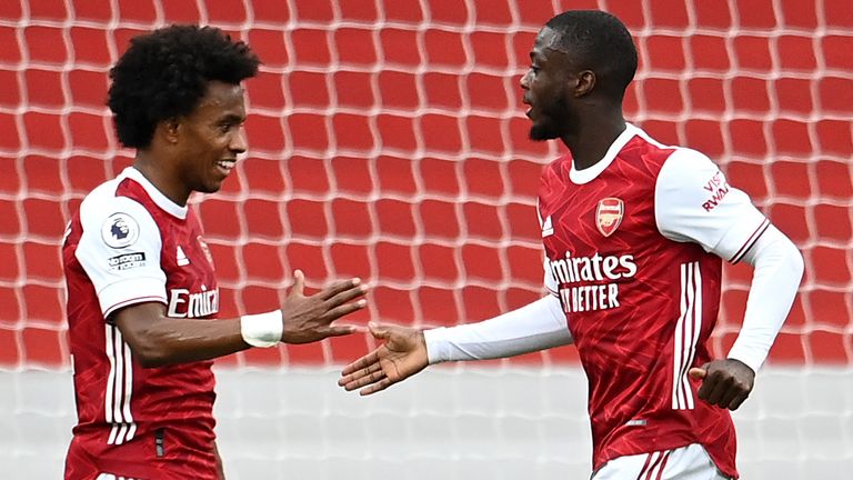 Nicolas Pepe celebrates with William after putting Arsenal 2-0 up against West Brom