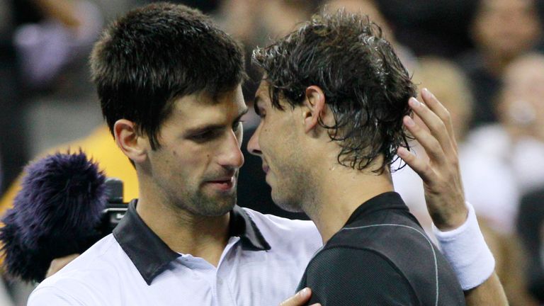 Novak Djokovic, left, of Serbia greets Rafael Nadal of Spain after Nadal won the men's championship match at the U.S. Open tennis tournament in New York, Monday, Sept. 13, 2010. (AP Photo/Charles Krupa)