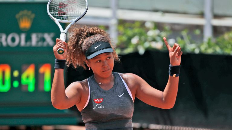 Naomi Osaka of Japan reacts after losing a point against Jessica Pegula of the United States during their match at the Italian Open tennis tournament, in Rome, Wednesday, May 12, 2021. Osaka lost against Pegula 7-6, 6-2.