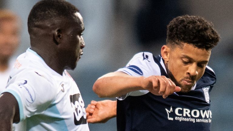 First-leg goalscorer Osman Sow (R) of Dundee in action with Fernandy Mendy of Raith (SNS)