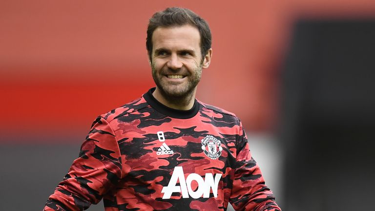 PA - Manchester United midfielder Juan Mata warms up