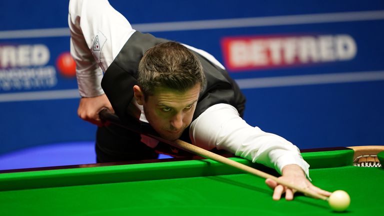 Mark Selby plays a shot during day 14 of the Betfred World Snooker Championships 2021 at The Crucible, Sheffield.
