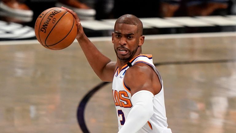 Phoenix Suns guard Chris Paul (3) looks to pass during the first quarter of an NBA basketball game against the Brooklyn Nets, Sunday, April 25, 2021, in New York.