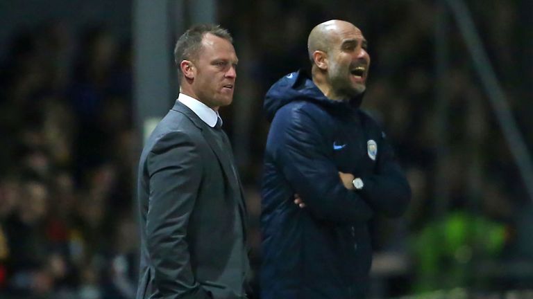Newport County manager Michael Flynn on the touchline next to Manchester City's Pep Guardiola during the FA Cup tie between their teams in 2019