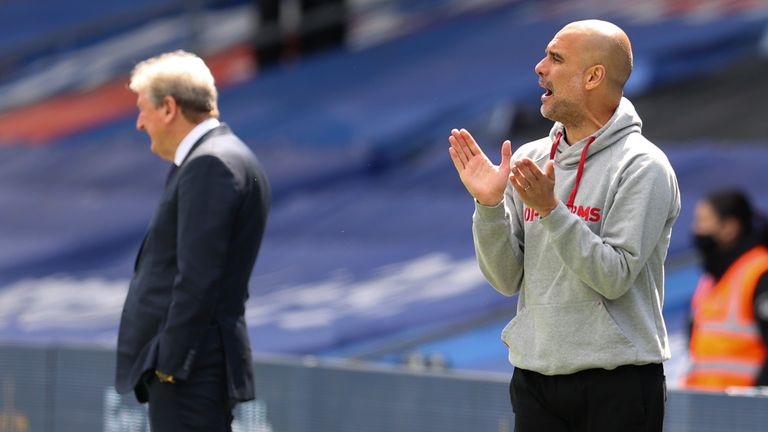 AP - Pep Guardiola (right) on the touchline with Roy Hodgson