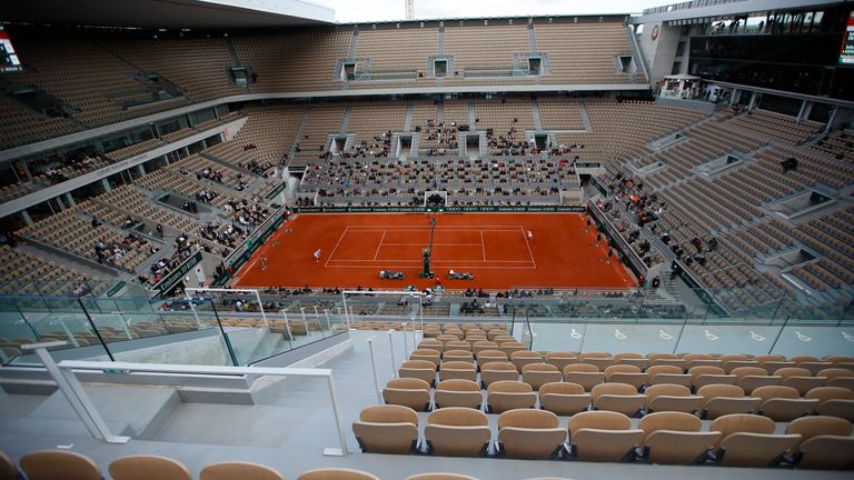 View of center court Philippe Chatrier where Sofia Kenin of the U.S., right serves against Poland's Iga Swiatek in the final match of the French Open tennis tournament at the Roland Garros stadium in Paris, France, Saturday, Oct. 10, 2020. (AP Photo/Alessandra Tarantino)