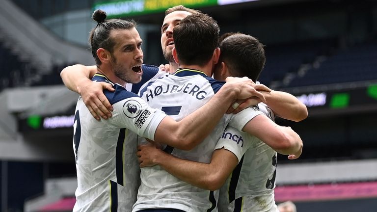 Pierre-Emile Hojbjerg celebrates with Spurs teammates after doubling their lead (AP)