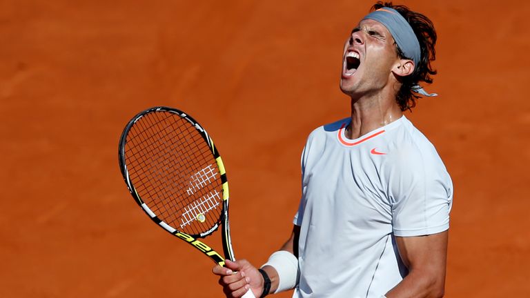 Spain's Rafael Nadal returns the ball to Serbia's Novak Djokovic during their semifinal match of the French Open tennis tournament at the Roland Garros stadium Friday, June 7, 2013 in Paris. (AP Photo/Petr David Josek)