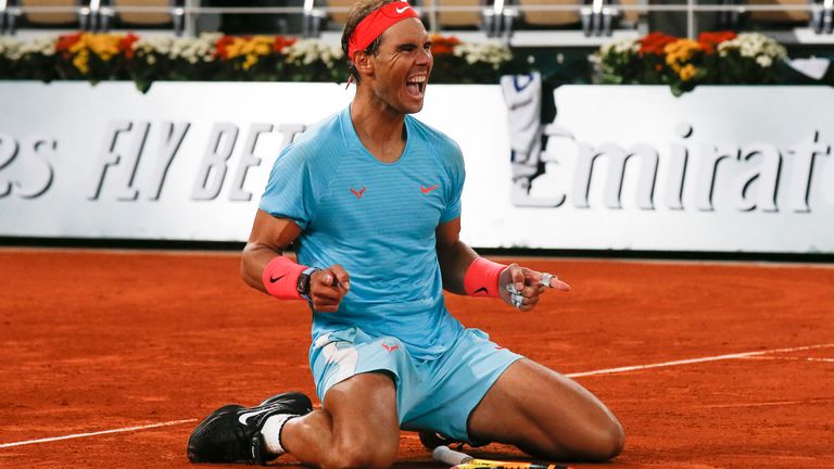 Spain's Rafael Nadal celebrates winning the final match of the French Open tennis tournament against Serbia's Novak Djokovic in three sets, 6-0, 6-2, 7-5, at the Roland Garros stadium in Paris, France, Sunday, Oct. 11, 2020. (AP Photo/Michel Euler)