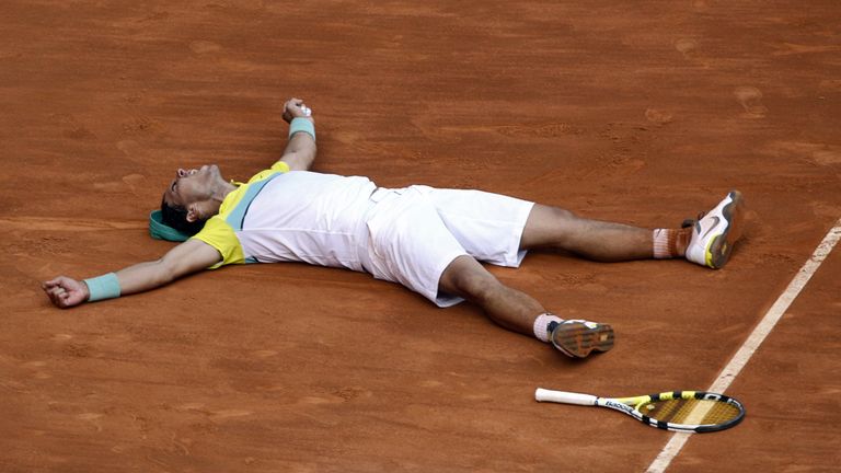 Rafael Nadal of Spain reacts after defeating Novak Djokovic of Serbia during their semi final match, at the Madrid Open Tennis in Madrid, Saturday, May 16, 2009. Nadal won 3-6, 7-6, 7-6. (AP Photo/Juan Manuel Serrano)
