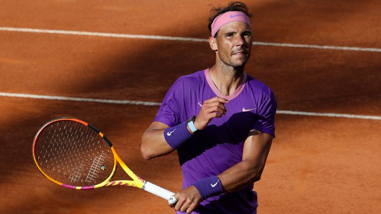 Spain's Rafael Nadal celebrates after beating Canada's Denis Shapovalov, in their 3rd round match at the Italian Open tennis tournament, in Rome, Thursday, May 13, 2021. Nadal won 6-3, 4-6, 6-7. (AP Photo/Alessandra Tarantino)