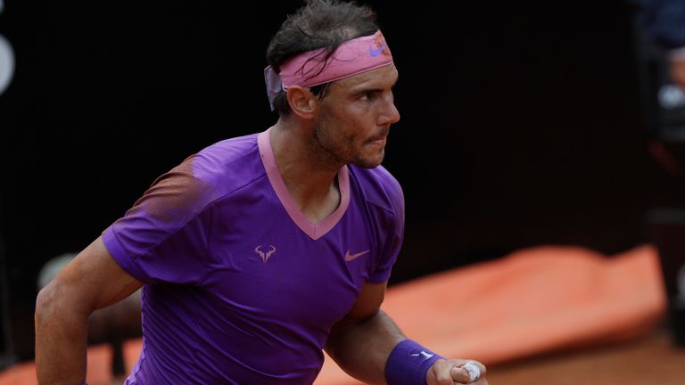 Spain's Rafael Nadal celebrates after winning a point during his quarter-final match against Germany's Alexander Zverev at the Italian Open tennis tournament, in Rome, Friday, May 14, 2021. (AP Photo/Gregorio Borgia)