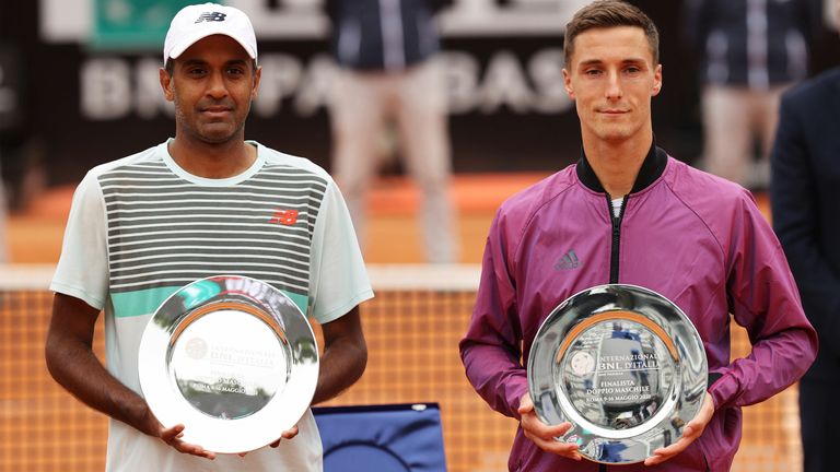 Rajeev Ram of the USA and Joe Salisbury of Great Britain pose with their runners up plates after losing the men's doubles final against Mate Pavic of Croatia and Nikola Mektic of Croatia at Foro Italico on May 16, 2021 in Rome, Italy. (Photo by Clive Brunskill/Getty Images)