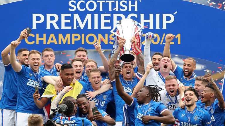 James Tavernier lifts the Scottish Premiership Trophy