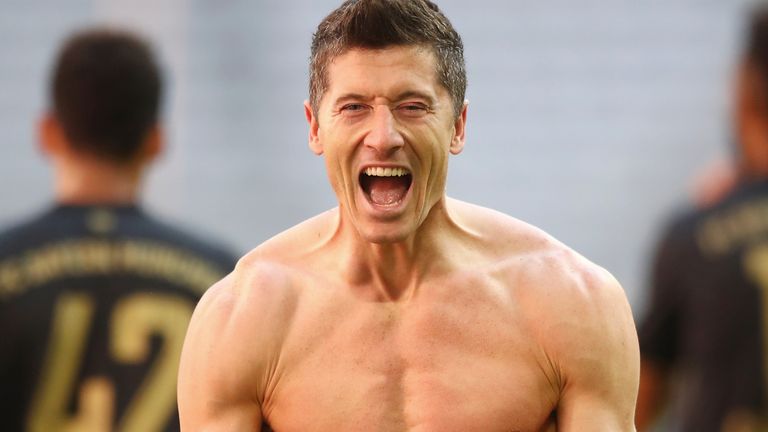 Robert Lewandowski celebrates after his late record-breaking goal 