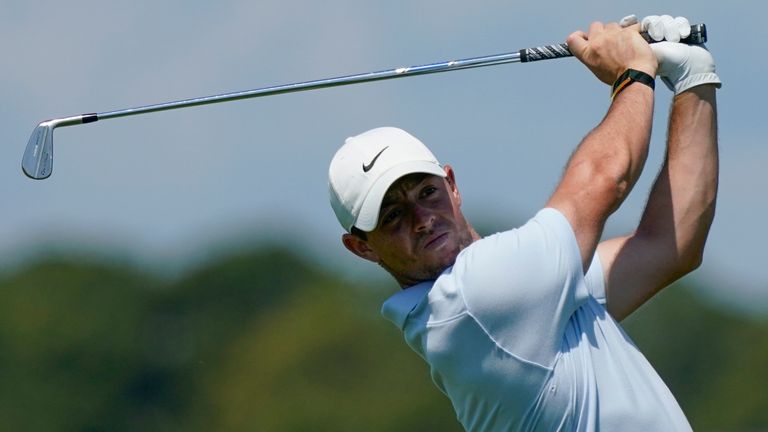 Rory McIlroy, of Northern Ireland, watches his tee shot on the 15th hole during a practice round at the PGA Championship