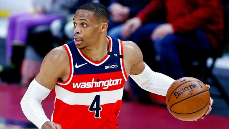 Washington Wizards&#39; Russell Westbrook drives against the Cleveland Cavaliers during the second half of an NBA basketball game, Friday, April 30, 2021, in Cleveland. (AP Photo/Ron Schwane)