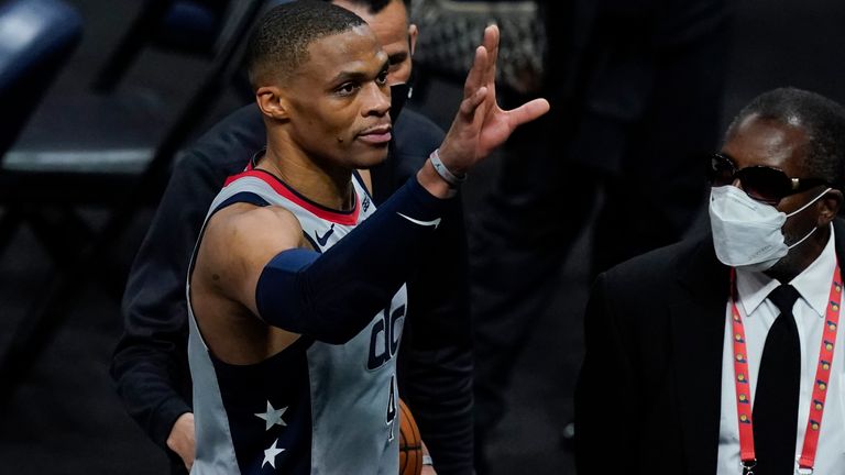 Washington Wizards&#39; Russell Westbrook waves to fans as he leaves the court following an NBA basketball game against the Indiana Pacers, Saturday, May 8, 2021, in Indianapolis. Washington won 133-132 in overtime.