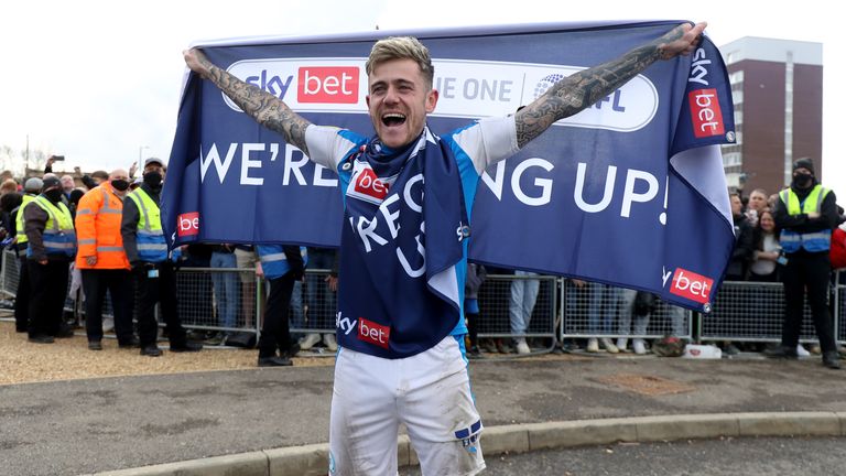 PA - Sam Szmodics celebrates Peterborough's promotion