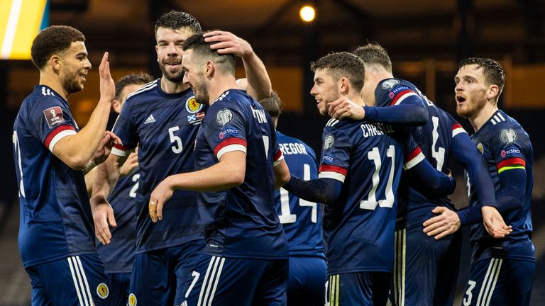 GLASGOW, SCOTLAND - MARCH 25: John McGinn celebrates after he makes it 2-2 with Che Adams (left) during a World Cup qualifier between Scotland and Austria at Hampden Park, on March 25, 2021, in Glasgow, Scotland. **Please note images are FREE for first use** (Photo by Alan Harvey / SNS Group)