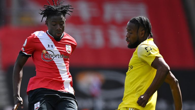 Mohammed Salisu and Joshua Onomah battle for possession