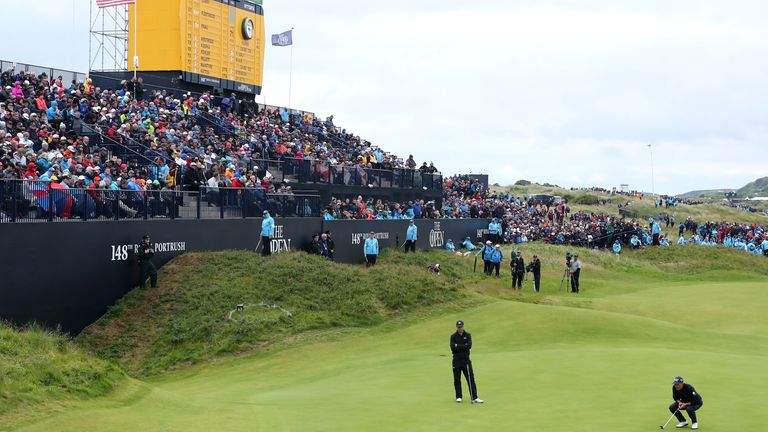 Sweden&#39;s Henrik Stenson and USA&#39;s Jordan Spieth on the 18th green during day four of The Open Championship 2019 at Royal Portrush Golf Club