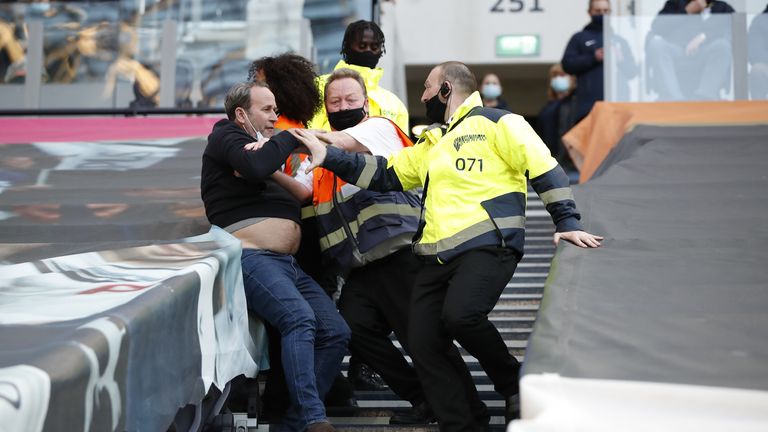 Tottenham supporters and stewards after Spurs' defeat to Aston Villa