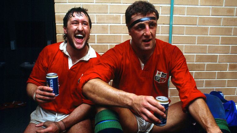 15/7/1989 British Lion Tour to Australia, Australia v British Lions, 3rd Test, Sydney, Mike Teague and Wade Dooley celebrate vicory for the Lions with cans of beer in the changing room. (Photo by Mark Leech/Getty Images)