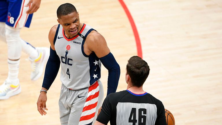 Washington Wizards guard Russell Westbrook (4) reacts to referee Ben Taylor (46) after being called for a foul during the second half of Game 3 in a first-round NBA basketball playoff series against the Philadelphia 76ers, Saturday, May 29, 2021, in Washington. (AP Photo/Nick Wass)