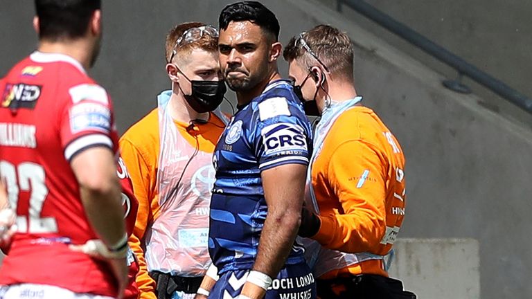 Wigan Warriors' Bevan French leaves the pitch with an injury during the Betfred Super League match at the AJ Bell Stadium, Salford. Picture date: Saturday May 22, 2021.