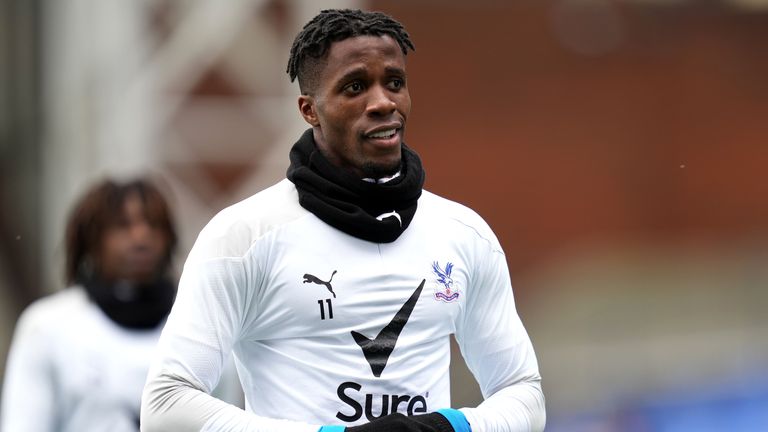 Crystal Palace's Wilfried Zaha warms up prior to kick-off