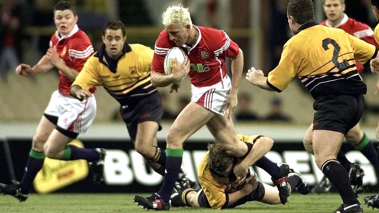 Lions Will Greenwood (centre) breaks through the Western Australia defence during the British and Irish Lions International Tour game at The WACA Stadium, Perth.