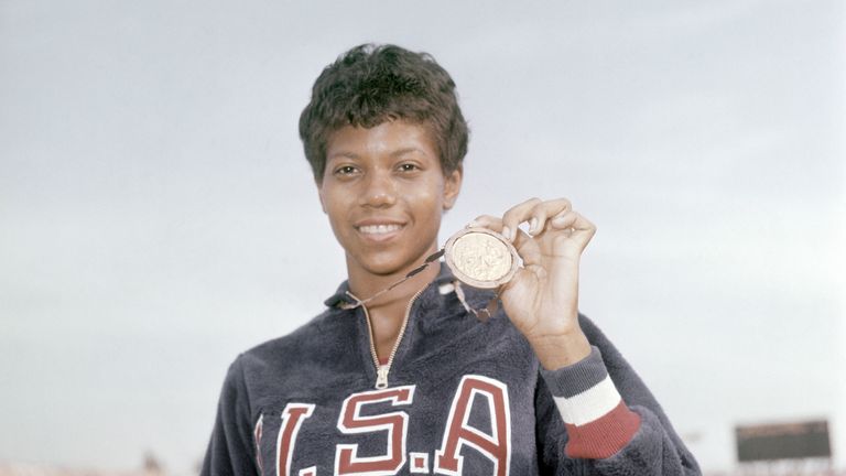 US athlete Wilma Rudolph shows the gold medal she won at the Women's 100 meters Summer Olympic Games sprint event on September 2, 1960 in Rome, Italy.