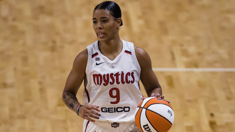 Natasha Cloud of the Washington Mystics brings the ball up against the Phoenix Mercury