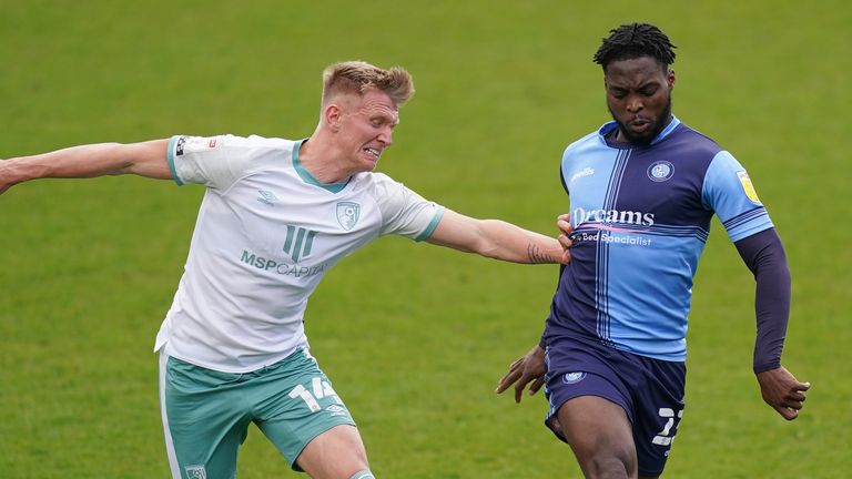 Fred Onyedinma and Bournemouth's Sam Surridge battle for the ball