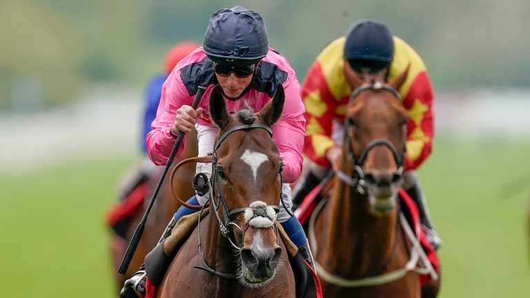 William Buick and  Spanish Mission (pink) win The Matchbook Yorkshire Cup