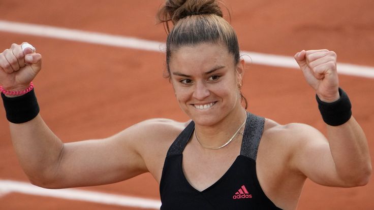 Maria Sakkari of Greece celebrates after defeating Belgium's Elise Mertens during their third round match on day 7, of the French Open tennis tournament at Roland Garros in Paris, France, Saturday, June 5, 2021. (AP Photo/Christophe Ena)