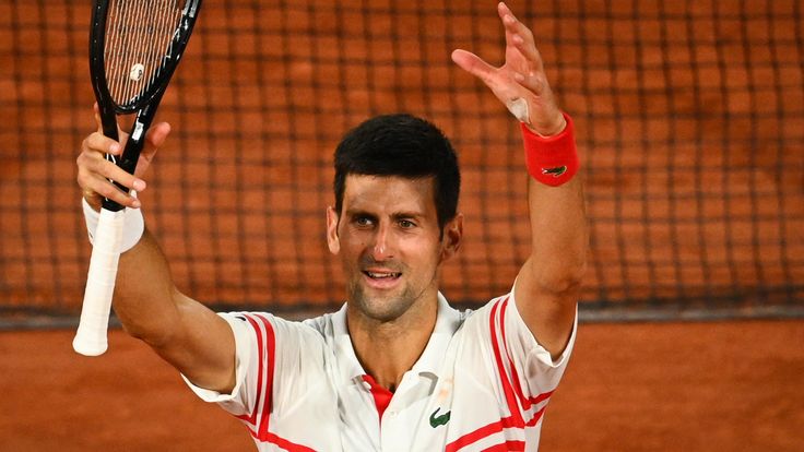 Serbia's Novak Djokovic celebrates after winning against Spain's Rafael Nadal at the end of their men's singles semi-final tennis match on Day 13 of The Roland Garros 2021 French Open tennis tournament in Paris on June 11, 2021. (Photo by Anne-Christine POUJOULAT / AFP) (Photo by ANNE-CHRISTINE POUJOULAT/AFP via Getty Images)