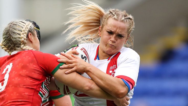 Picture by Alex Whitehead/SWpix.com - 25/06/2021 - Rugby League - Women's International - England v Wales - Halliwell Jones Stadium, Warrington, England - England's Shona Hoyle is tackled by Wales' Lowri Norkett.