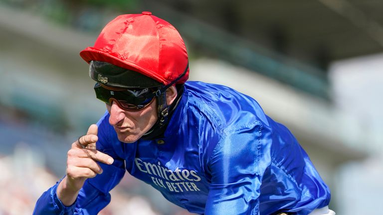 Adam Kirby celebrates as Adayar wins the Cazoo Derby