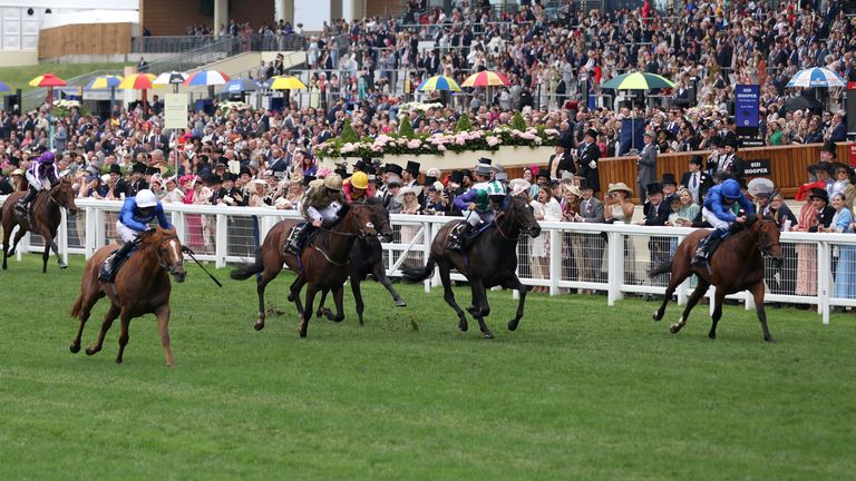 Creative Force ridden by James Doyle (white hat) wins the Jersey Stakes