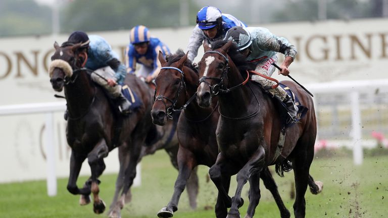 Alenquer ridden by Tom Marquand (right) wins the King Edward VII Stakes 