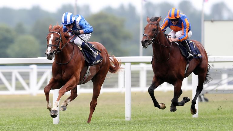 Mohaafeth ridden by jockey Jim Crowley (left) wins the Hampton Court Stakes 