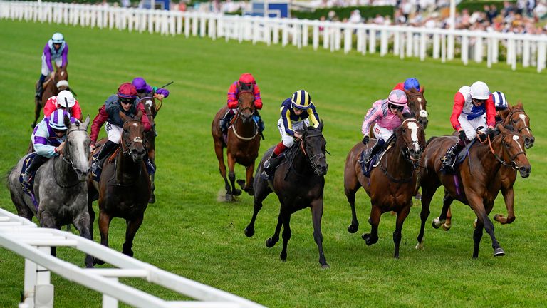 Laura Pearson riding Lola Showgirl (left) win the Kensington Palace Stakes 