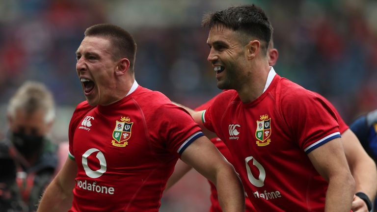 British and Irish Lions' Josh Adams, left, celebrates with teammate after scoring a try during a friendly rugby match between British and Irish Lions and Japan at the Murrayfield stadium in Edinburgh, Scotland, Saturday, June 26, 2021. (AP Photo/Scott Heppell)